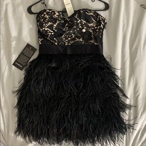 Cocktail dress w feathered bottom